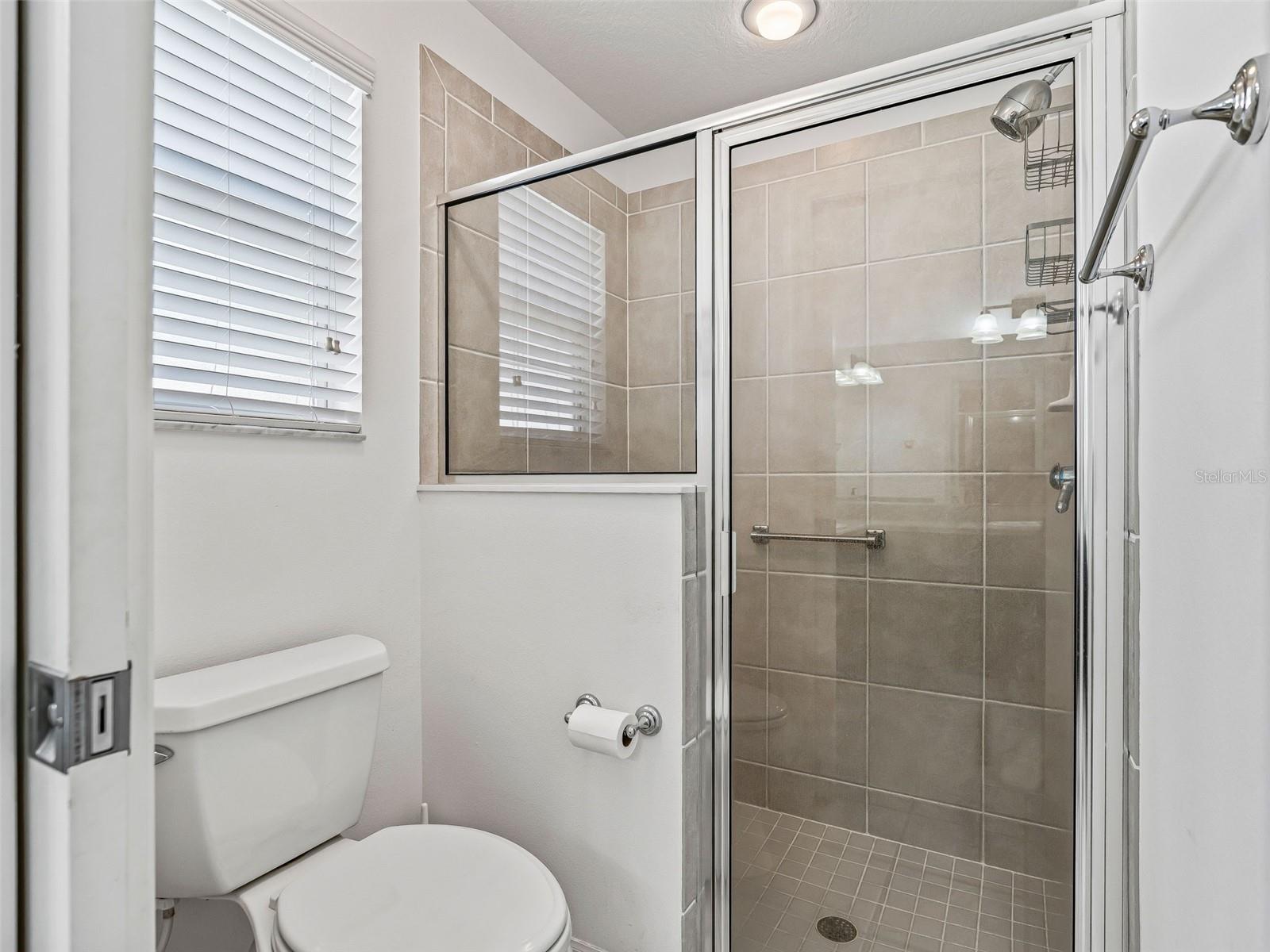 Primary water closet and walk in shower