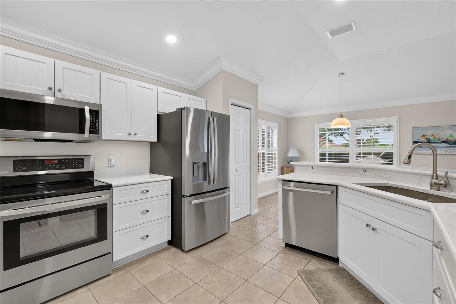 Updated white cabinets and stainless steel appliances