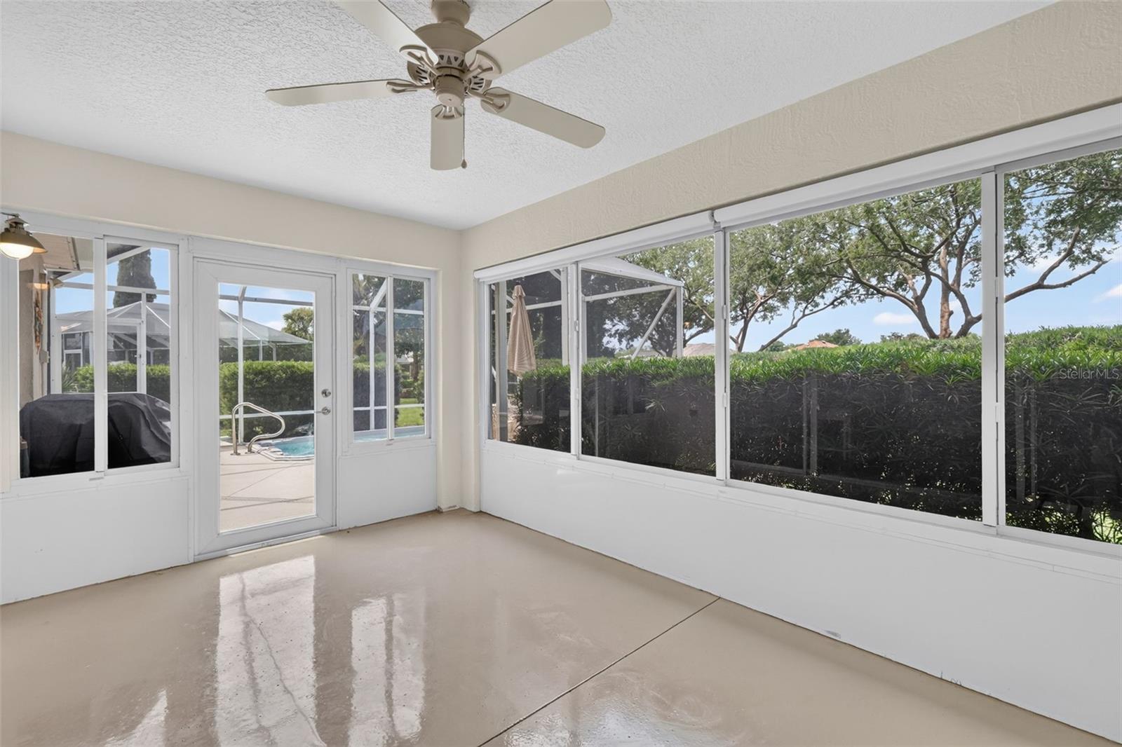 Spacious enclosed lanai under heat and air