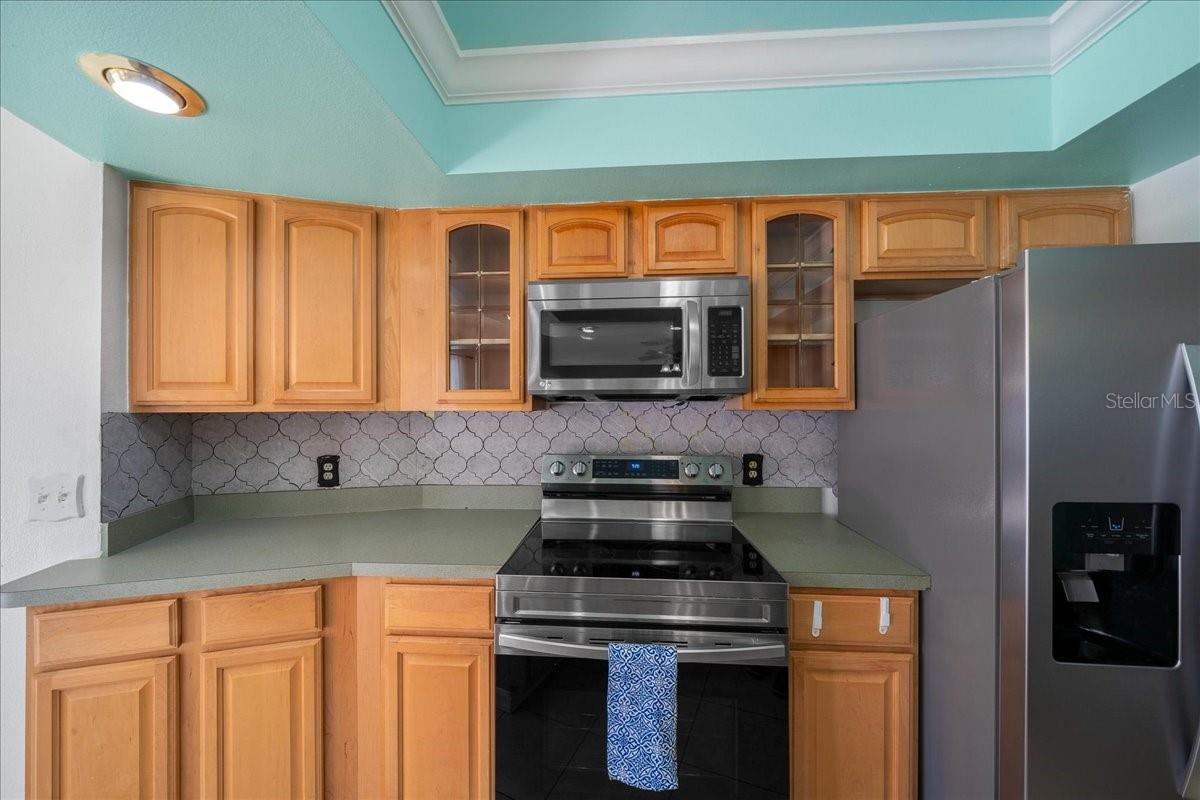 Stainless Steel Stove, Microwave, & Fridge