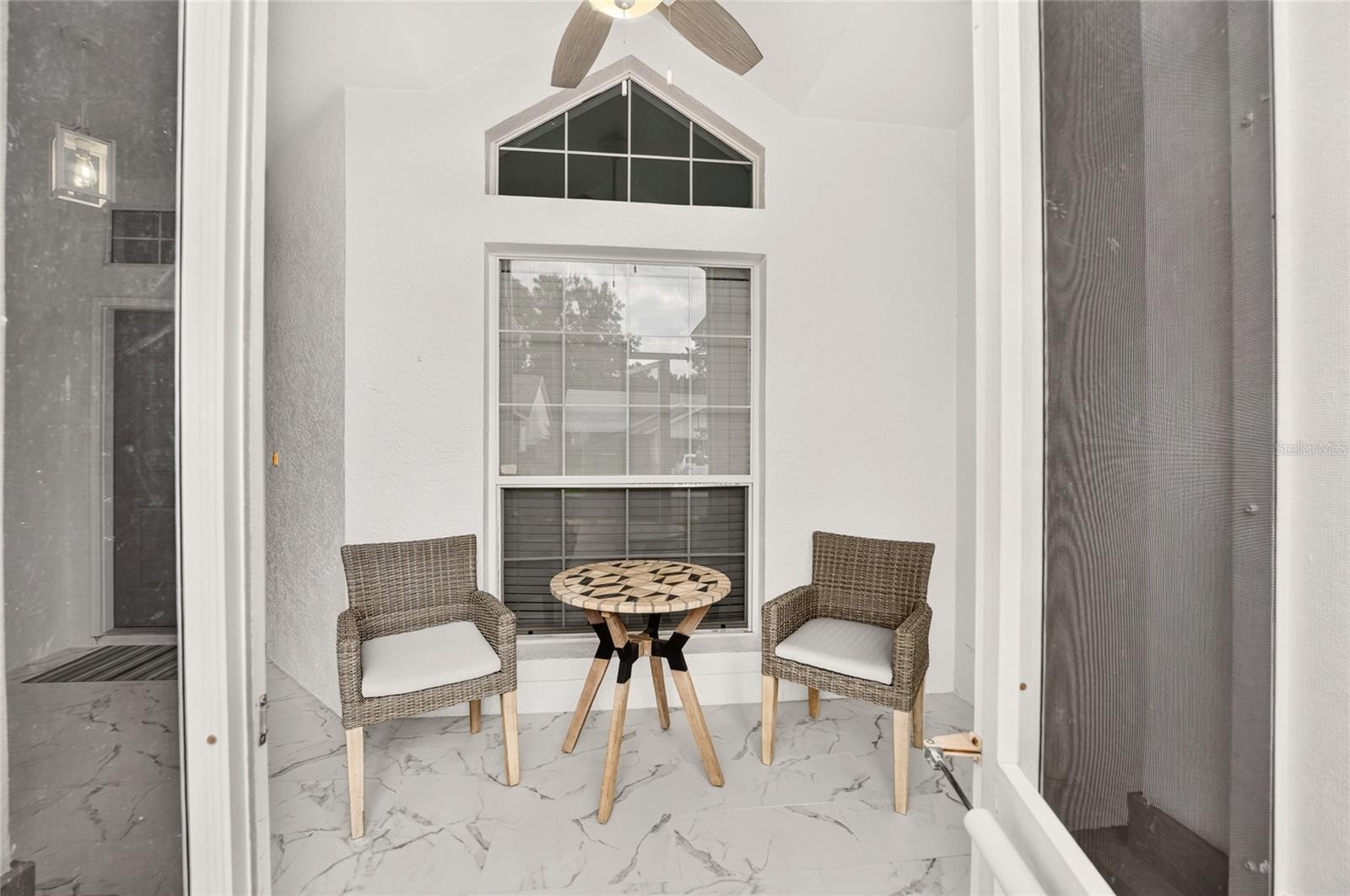 Welcoming Screened in Front Patio