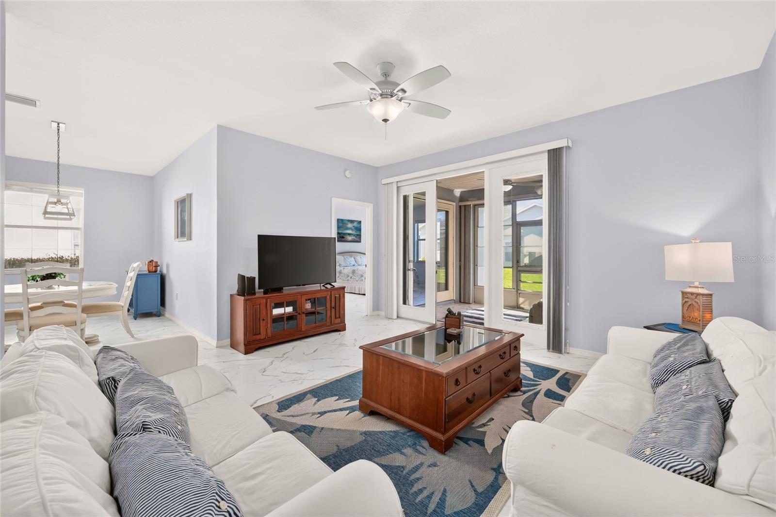 Open to Dining Room and French Doors to Florida Room