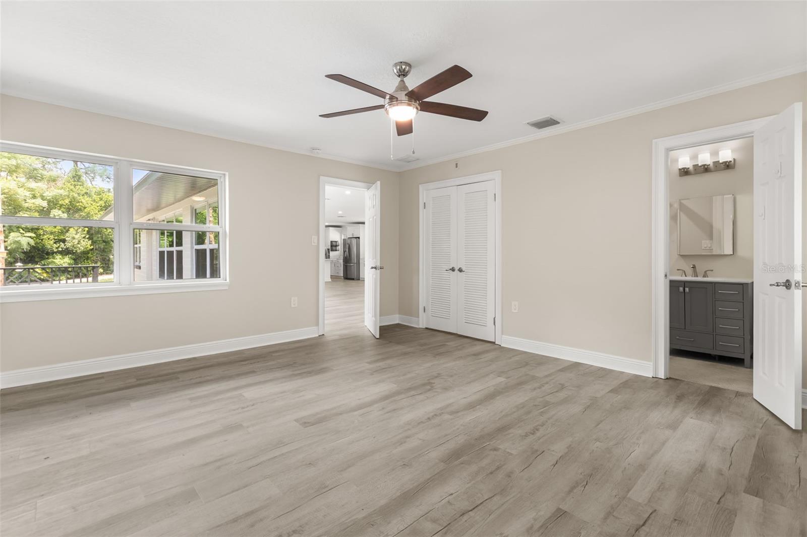 Bedroom 4 with office area and ensuite bathroom