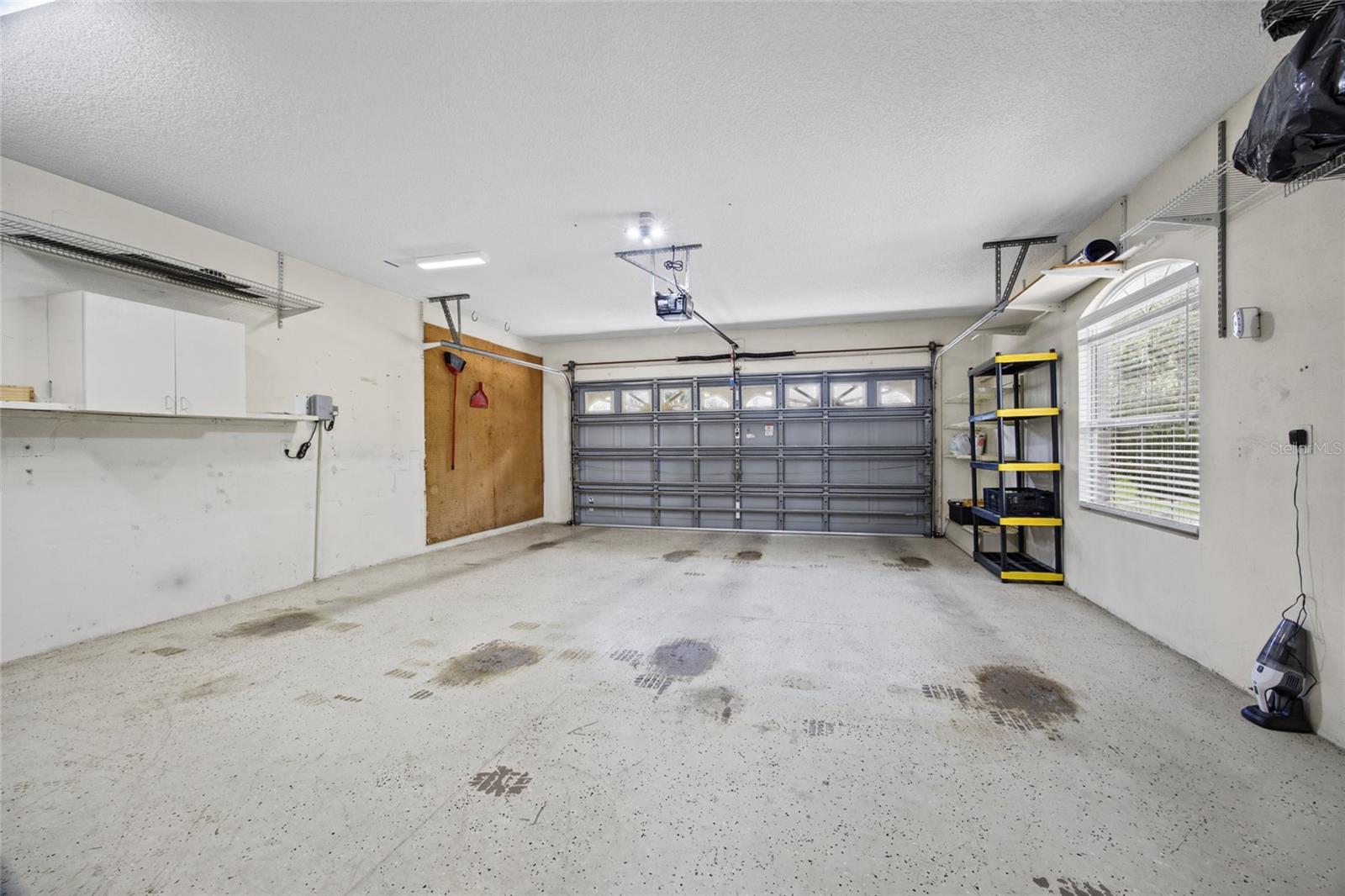 2 Car Garage with storage shelving
