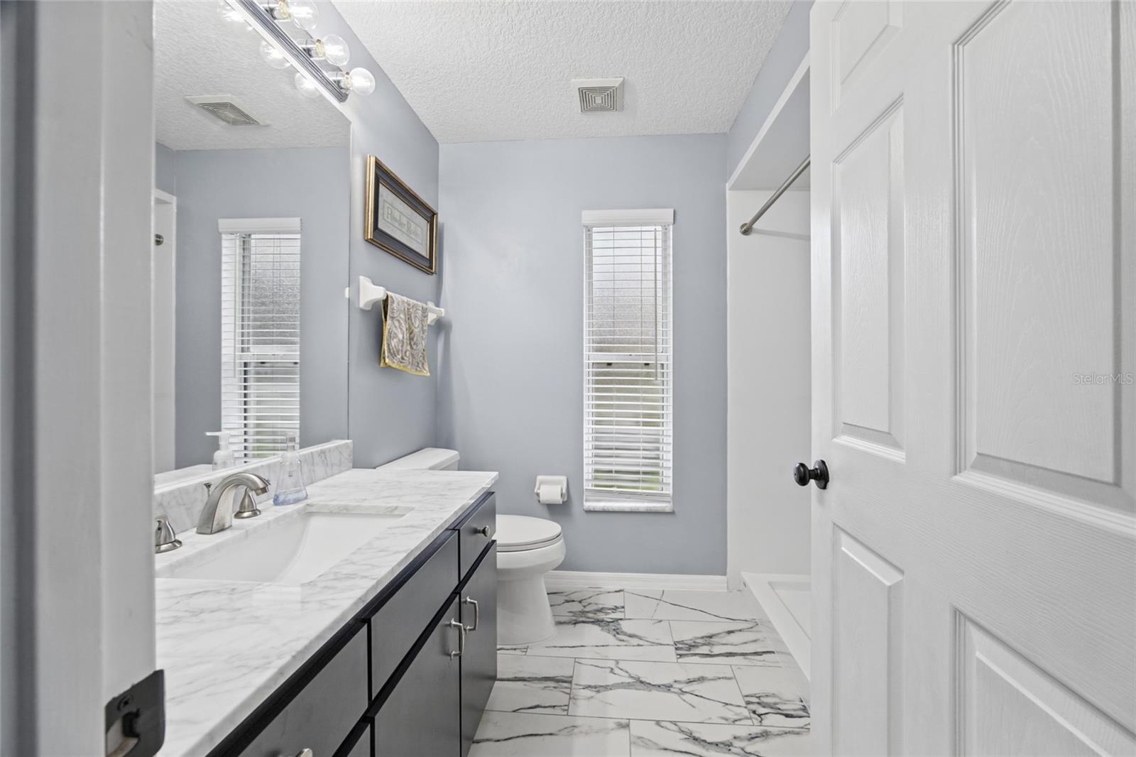 Guest bathroom with walk-in shower