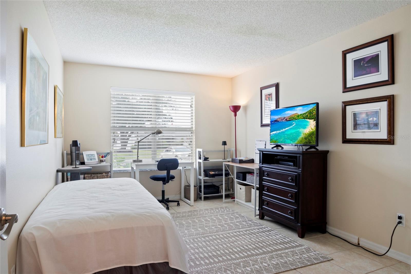 Guest Bedroom, Office, Craft Room, tile floor and closet.