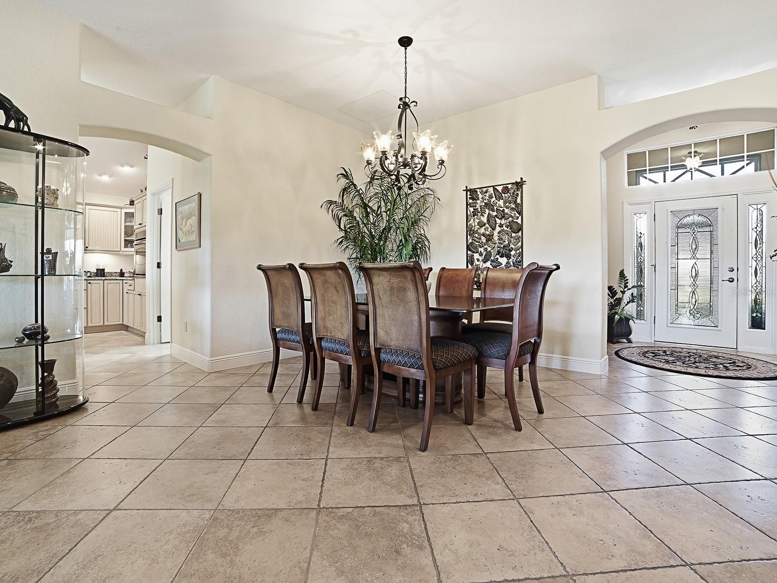 ALL TILE FLOORING IN THE MAIN LIVING/DINING AREA ALL TILE FLOORING IN THE MAIN LIVING/DINING AREA