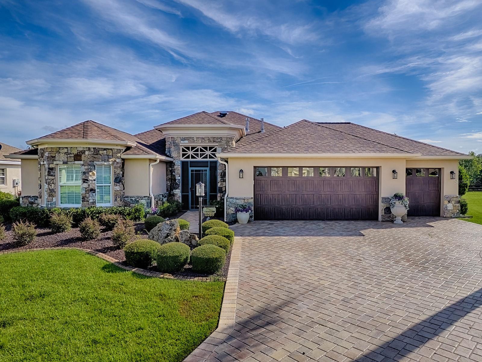 STUNNING LANDSCAPING AND UNIQUE EXTERIOR STONE AND STUCCO WORK STUNNING LANDSCAPING AND UNIQUE EXTERIOR STONE AND STUCCO WORK