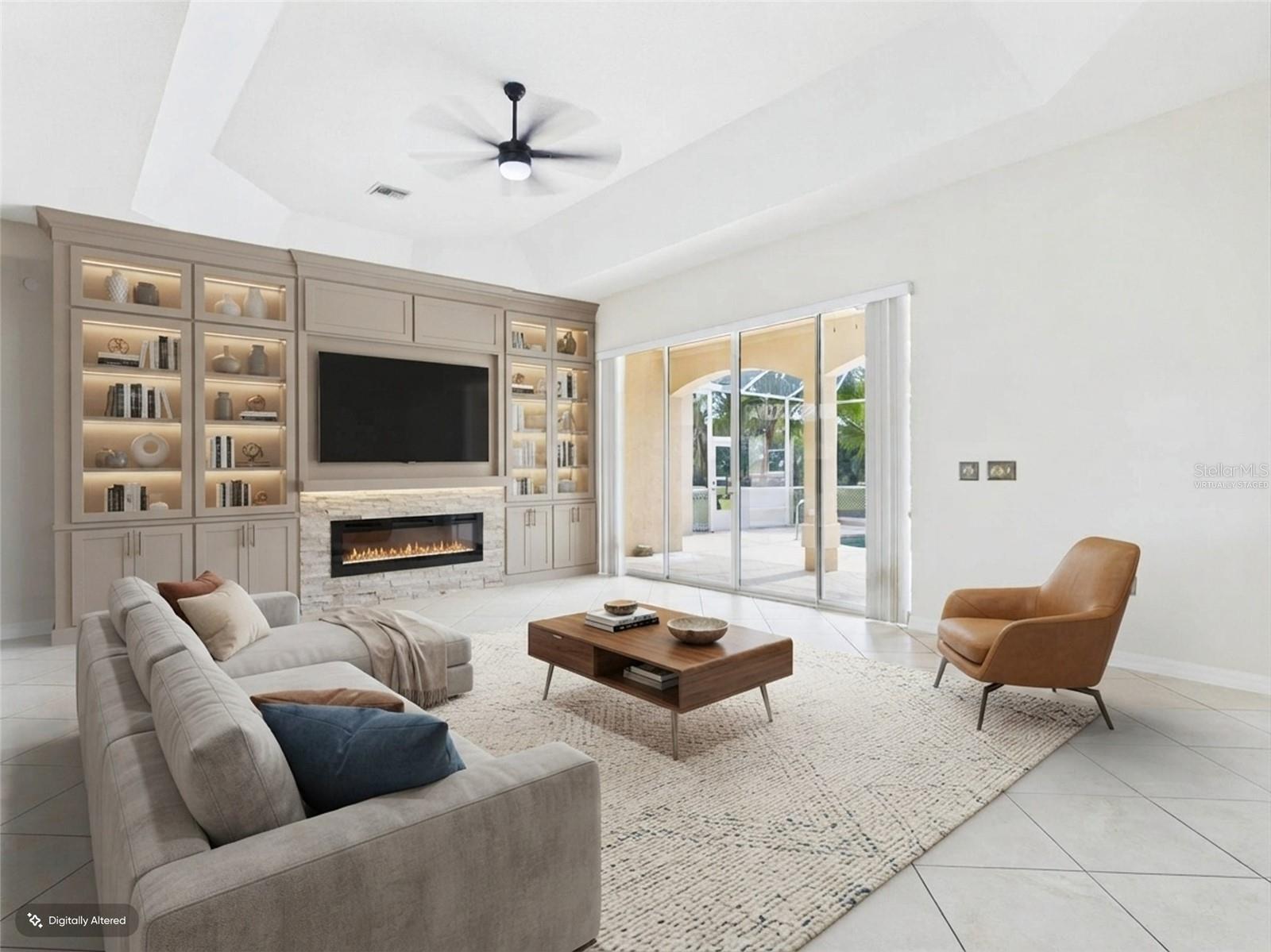 Living Room w/sliders to Pool - virtually staged