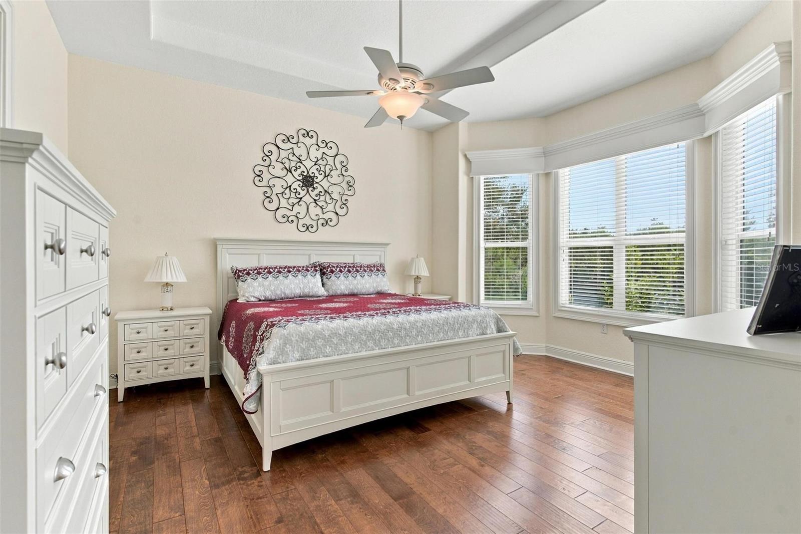 Oversized primary suite with beautiful shutters.