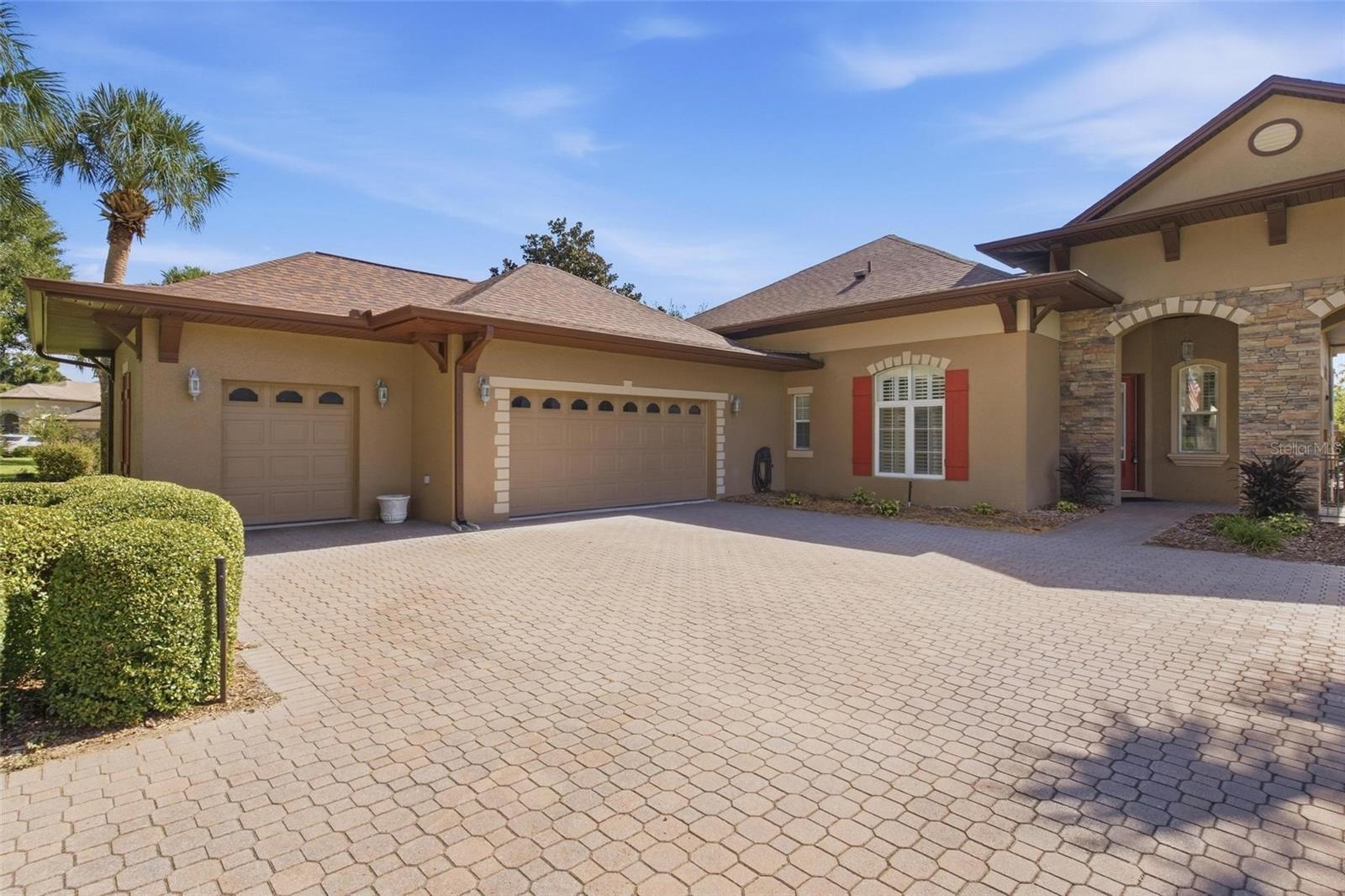 Exterior of home with beautiful shutters.