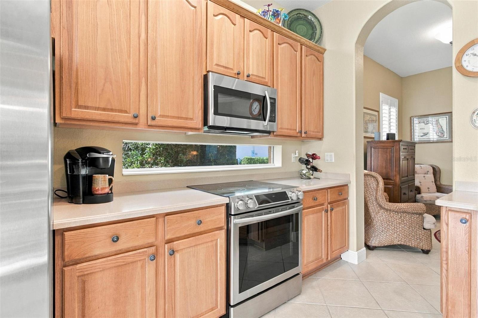 Love this window feature in between the microwave and Range...