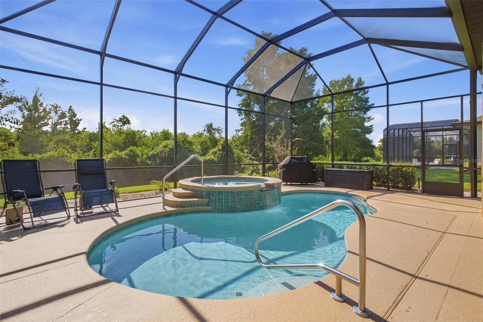 No rear neighbors, enjoy the pool with no disturbances!