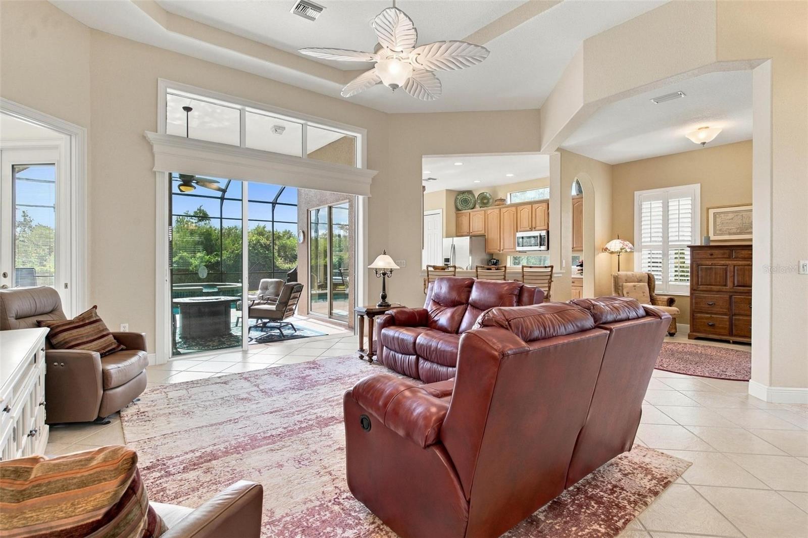 Great room with sliding glass doors that lead to your relaxing pool.