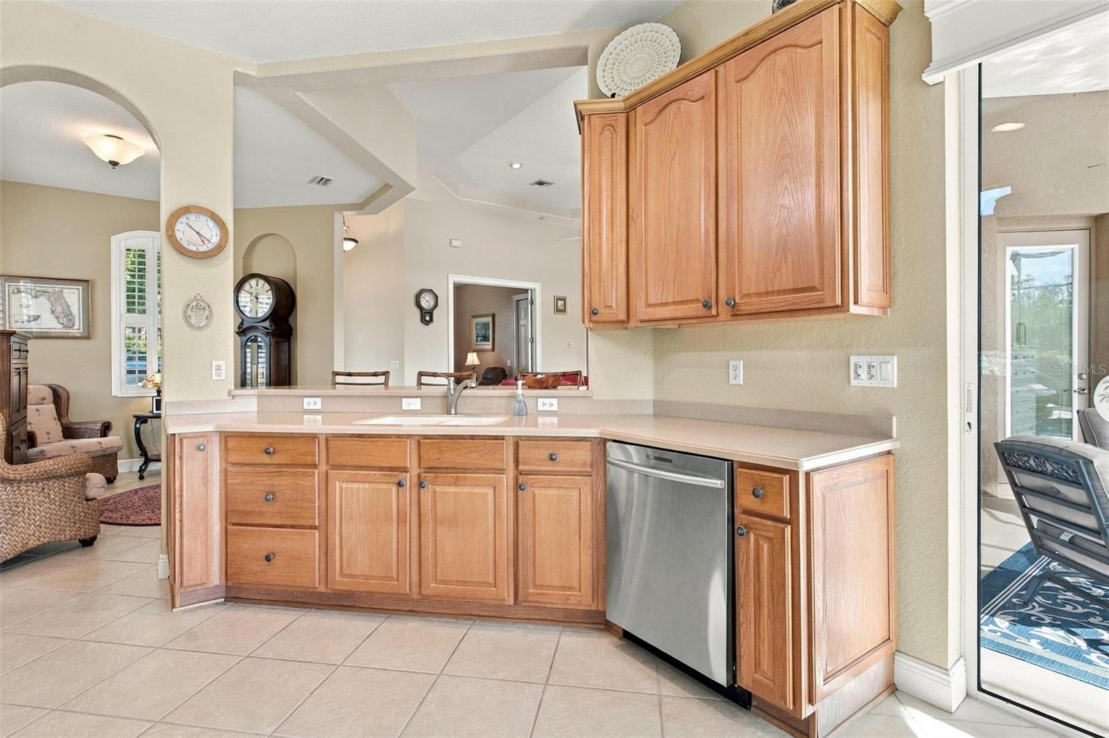 Kitchen features snack bar...built in Dishwasher!