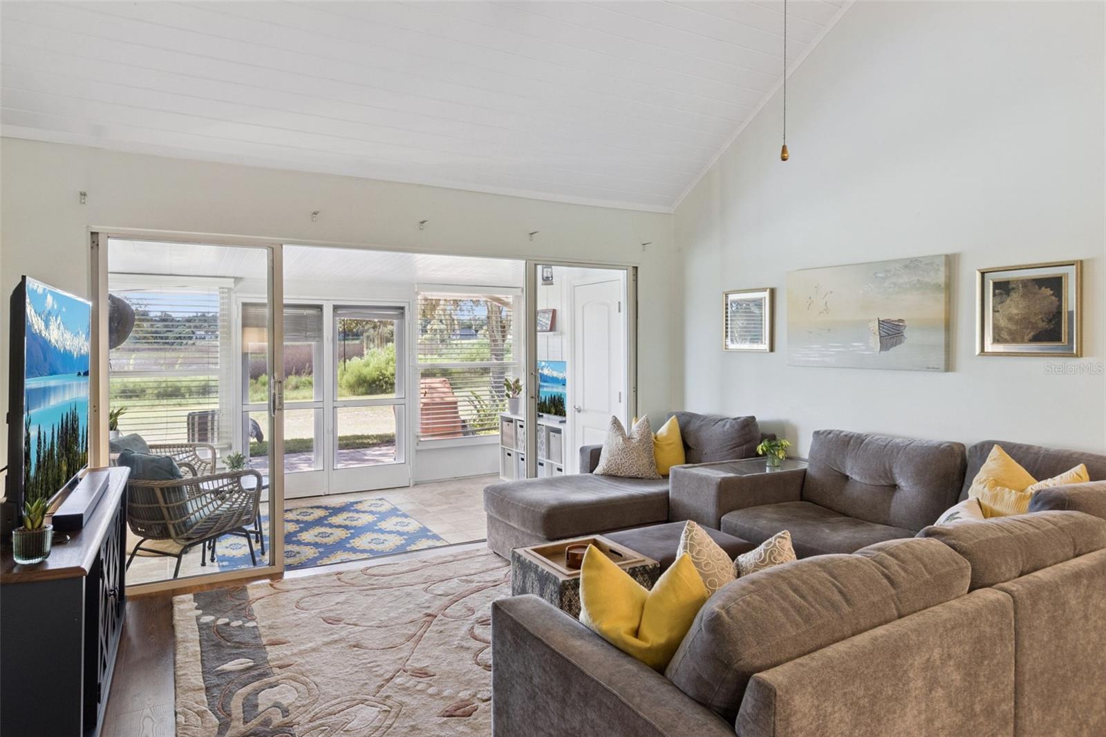 Plenty of space for over-sized furniture in the open great room and sunroom.