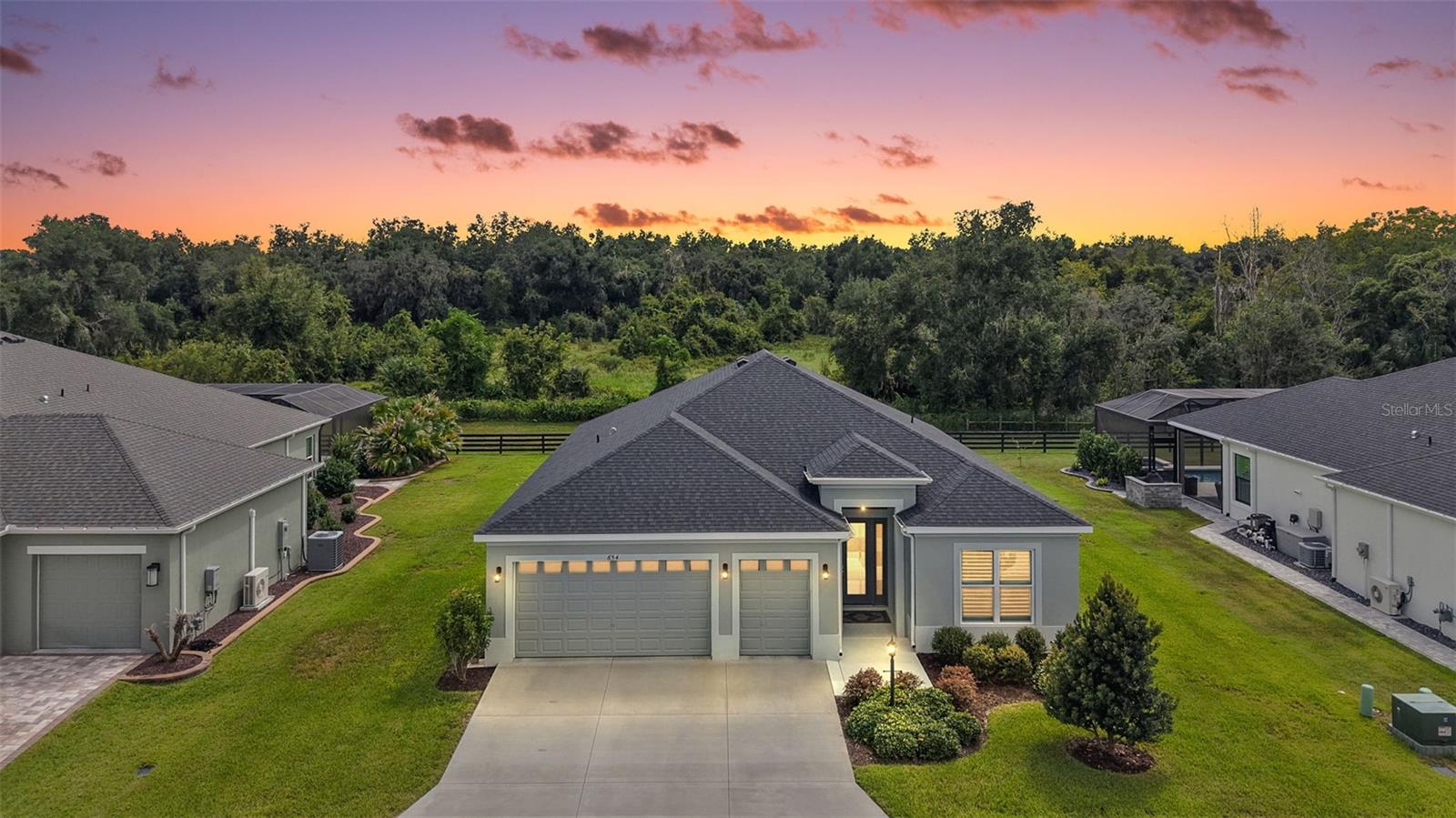 Twilight Front Elevation with PRIVATE Rear PRESERVE VIEWS Twilight Front Elevation with PRIVATE Rear PRESERVE VIEWS