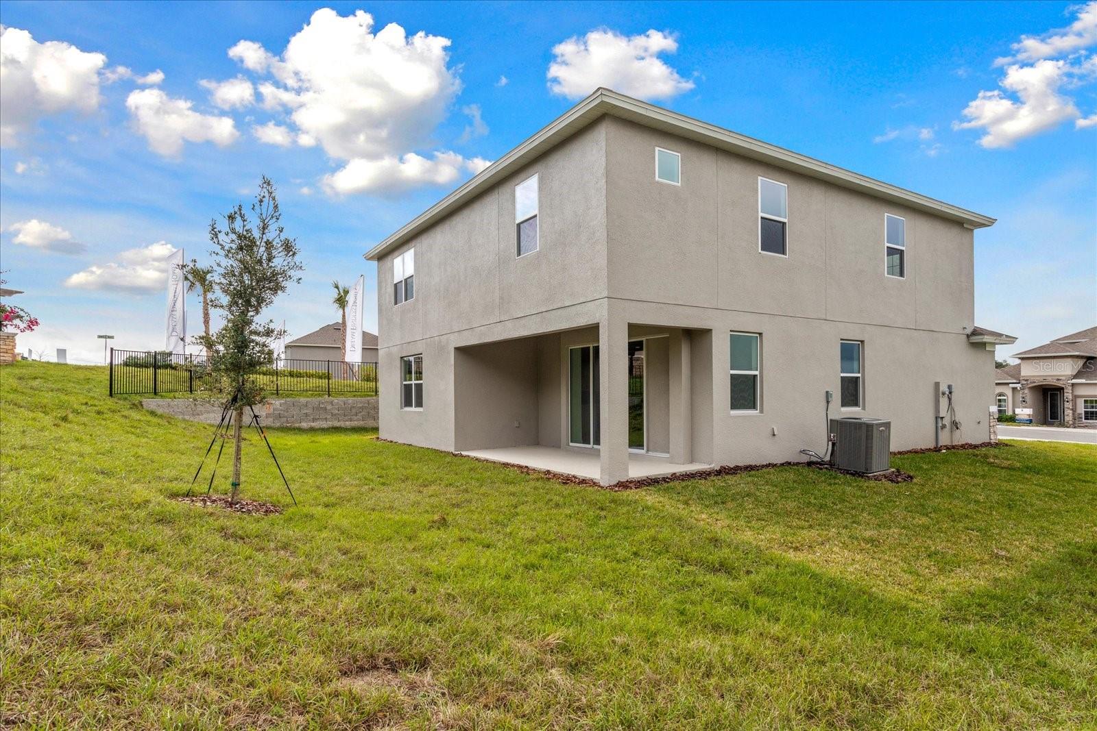 The sample photos included are of the model home and are meant to showcase the craftsmanship and design quality.