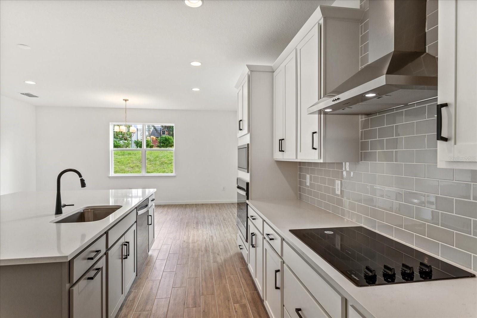 The sample photos included are of the model home and are meant to showcase the craftsmanship and design quality.