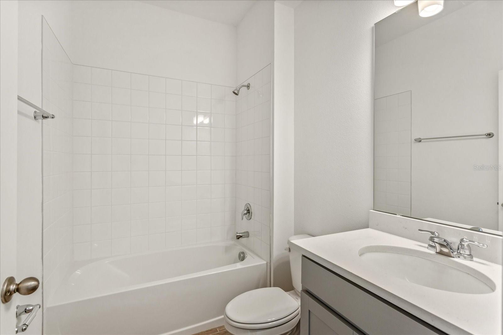 The sample photos included are of the model home and are meant to showcase the craftsmanship and design quality.