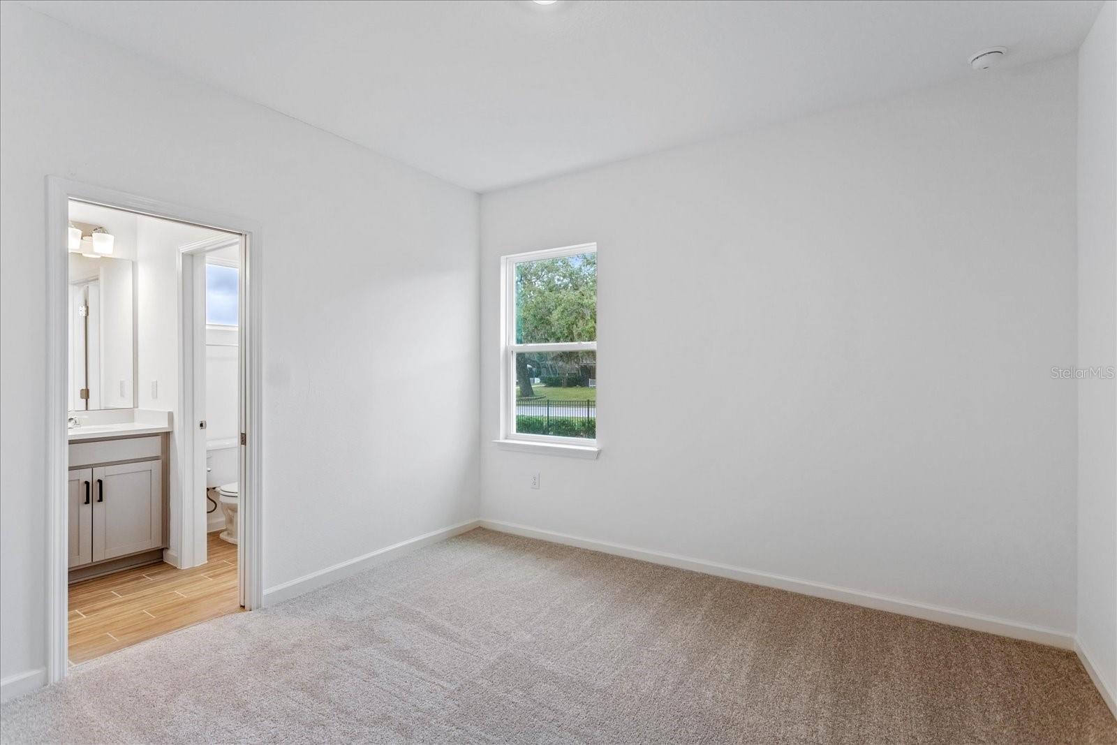 The sample photos included are of the model home and are meant to showcase the craftsmanship and design quality.