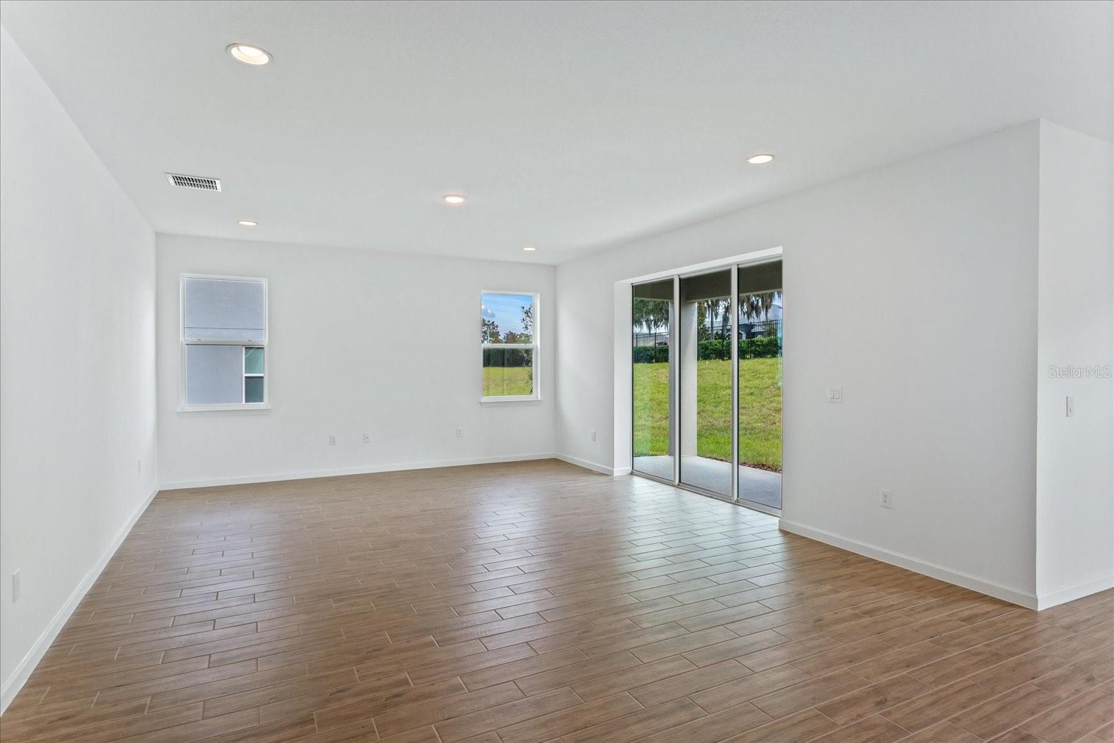 The sample photos included are of the model home and are meant to showcase the craftsmanship and design quality.