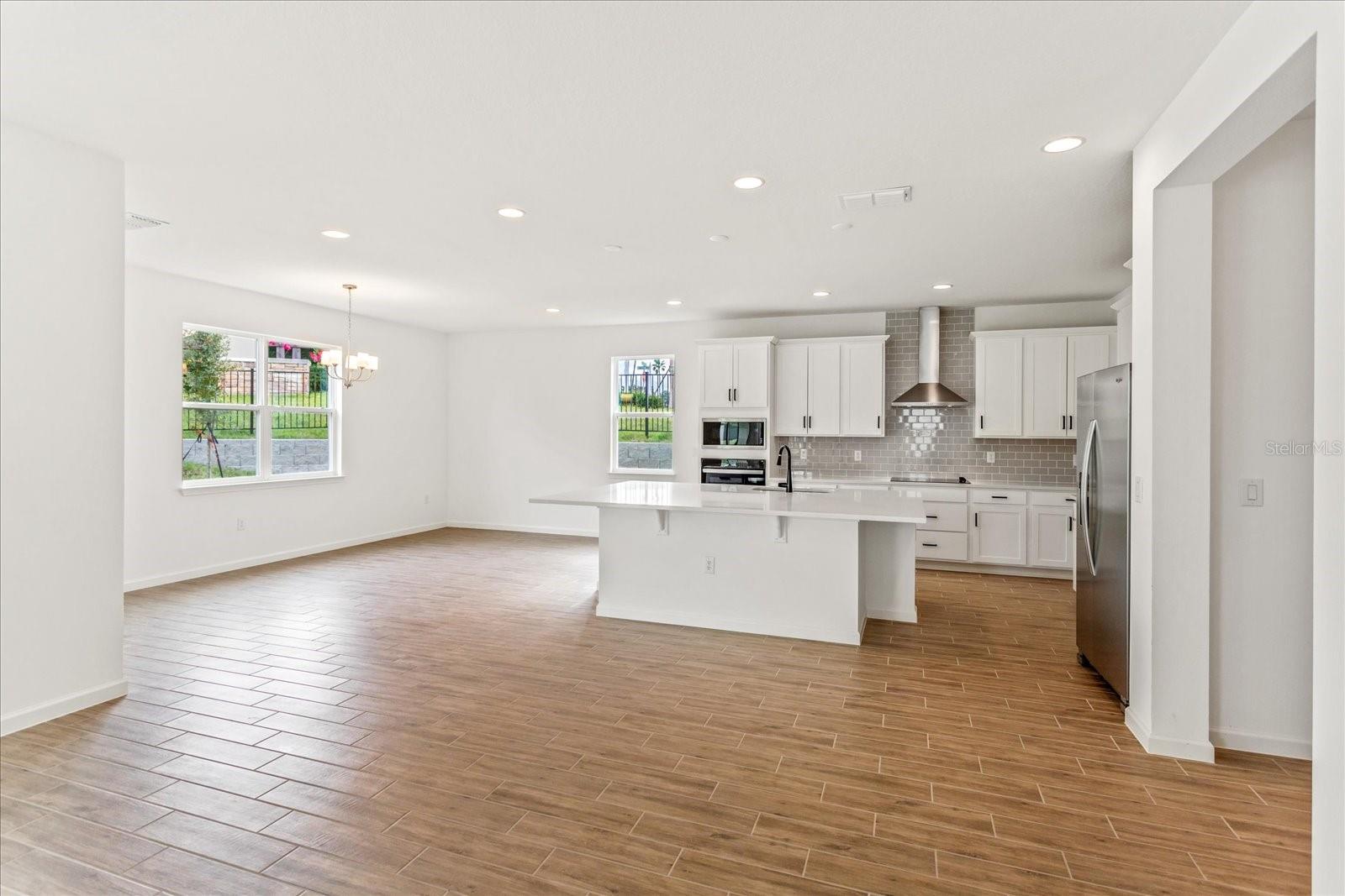 The sample photos included are of the model home and are meant to showcase the craftsmanship and design quality.