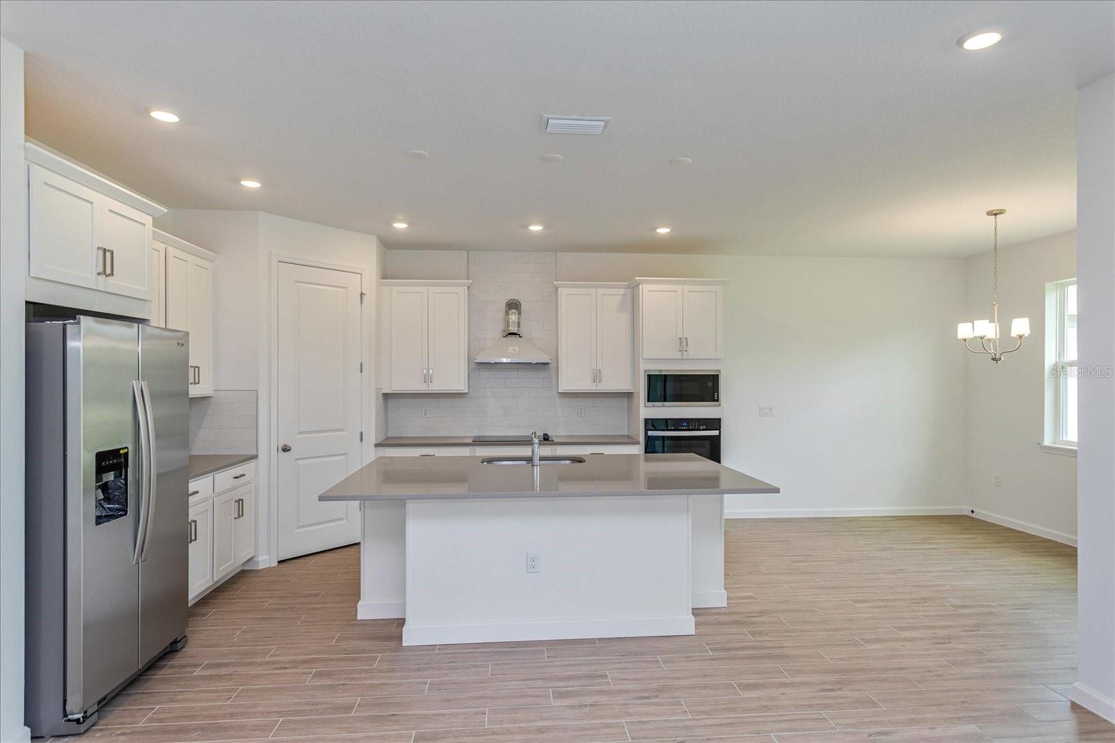 Note: The sample photos included are of the model home and are meant to showcase the craftsmanship and design quality. Note: The sample photos included are of the model home and are meant to showcase the craftsmanship and design quality.