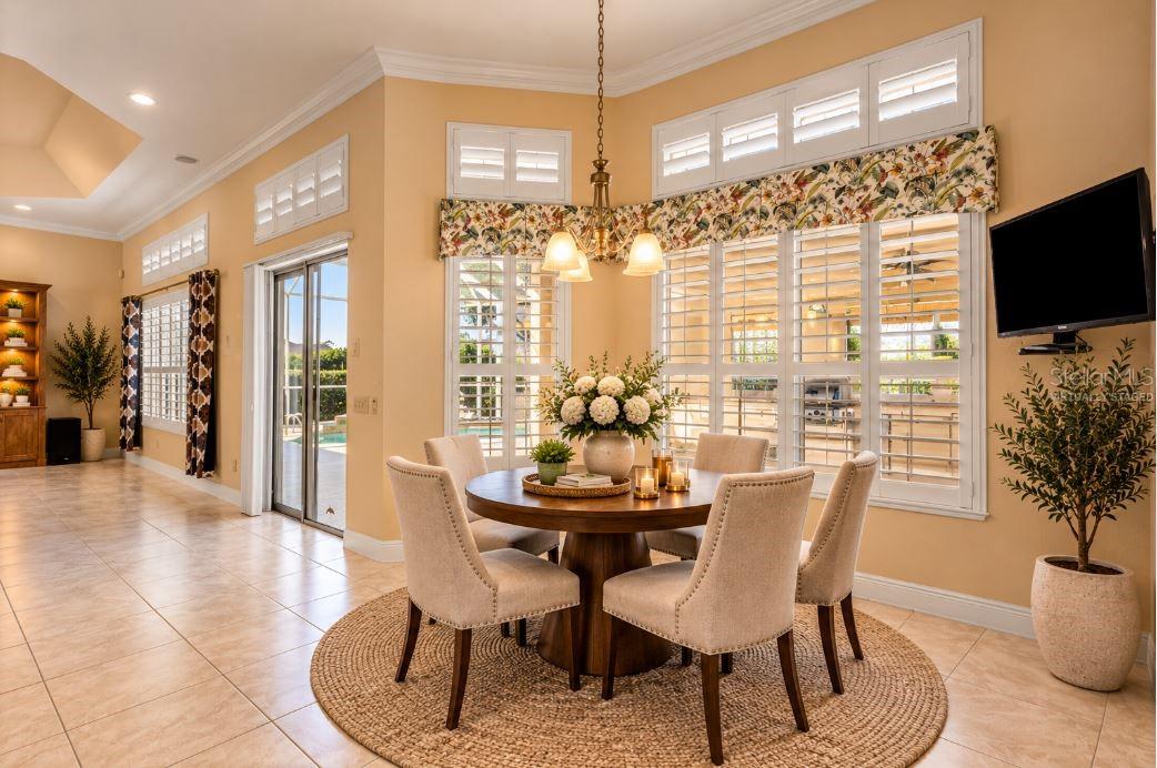 Virtually staged breakfast nook.