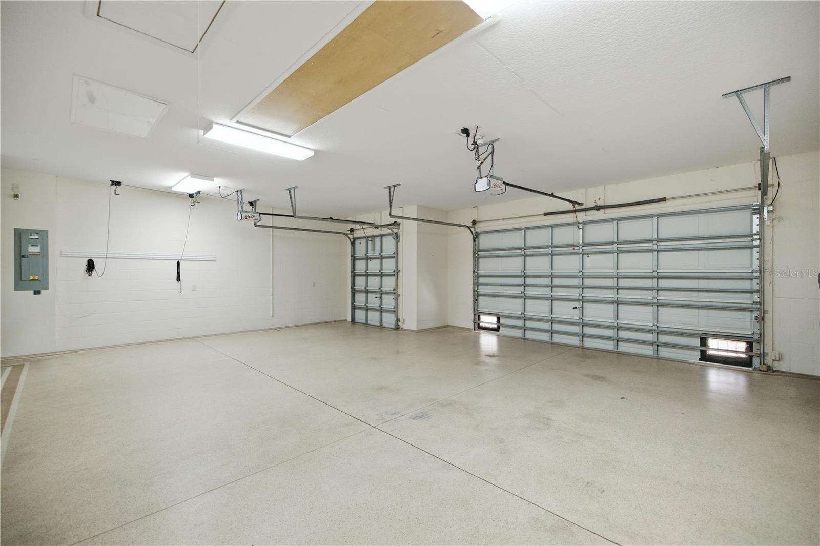 electric garage door screen, Magic Stairs, an electric attic lift, attic stairs, and a solar attic fan.