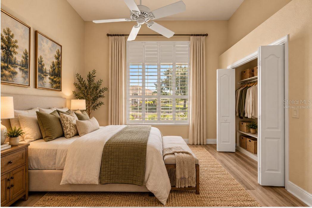 Virtually staged guest bedroom.