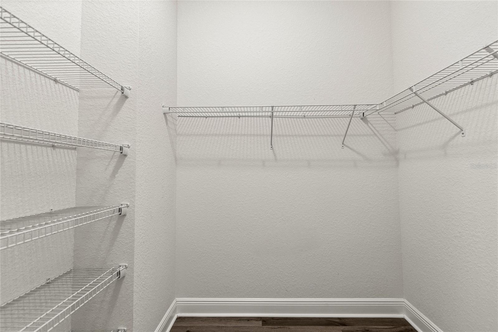 His Walk-In Closet.
