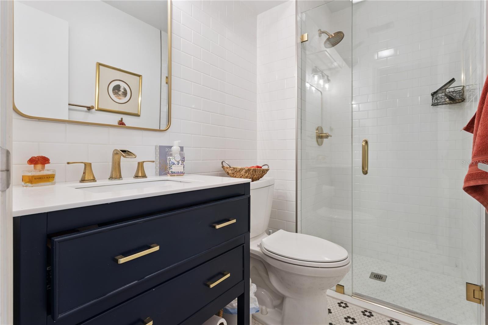 Bath off of the kitchen and family room.