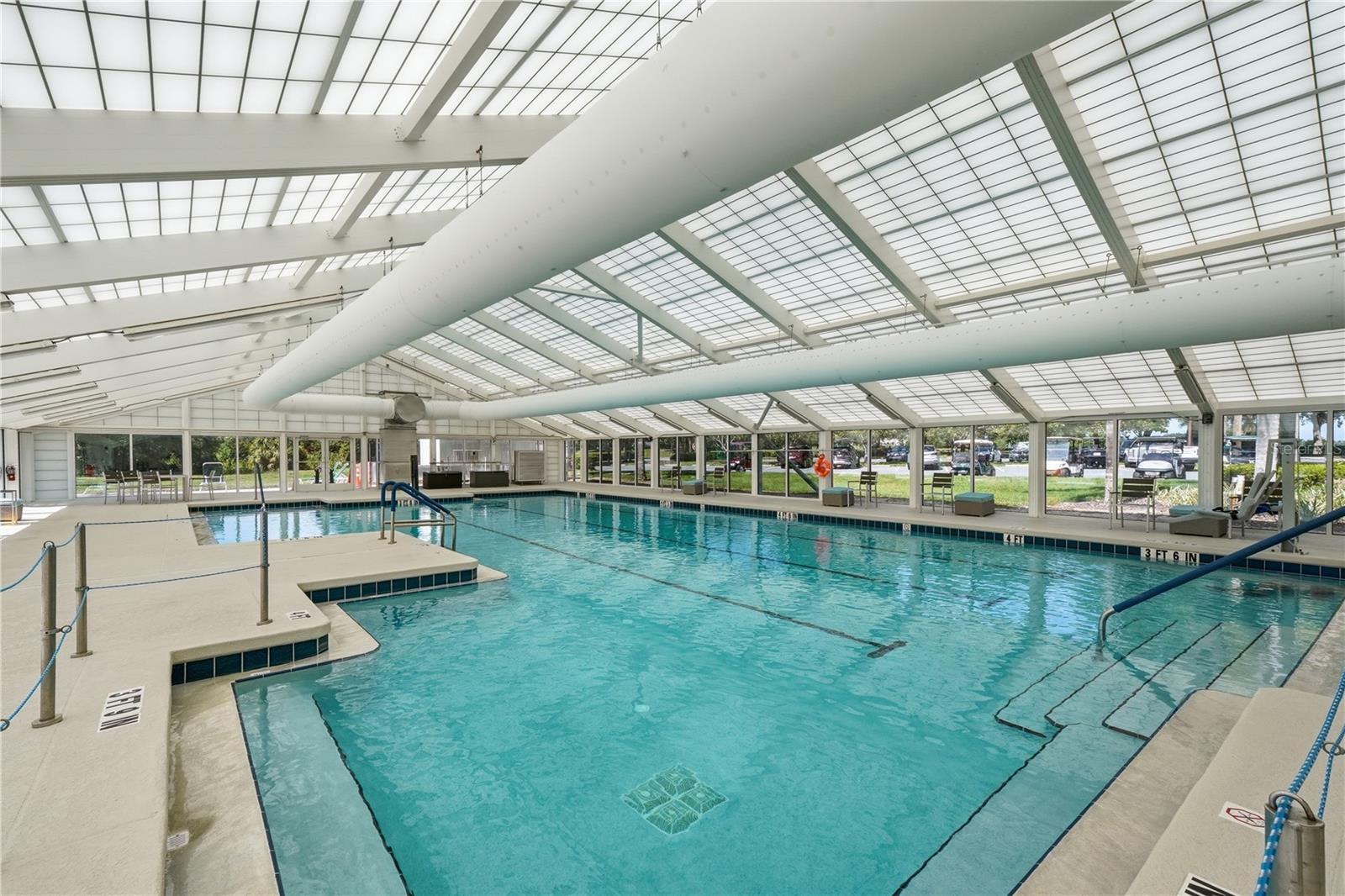 The newly-replaced INDOOR POOL where residents and their guests can SWIM YEAR ROUND in the HEATED pool.