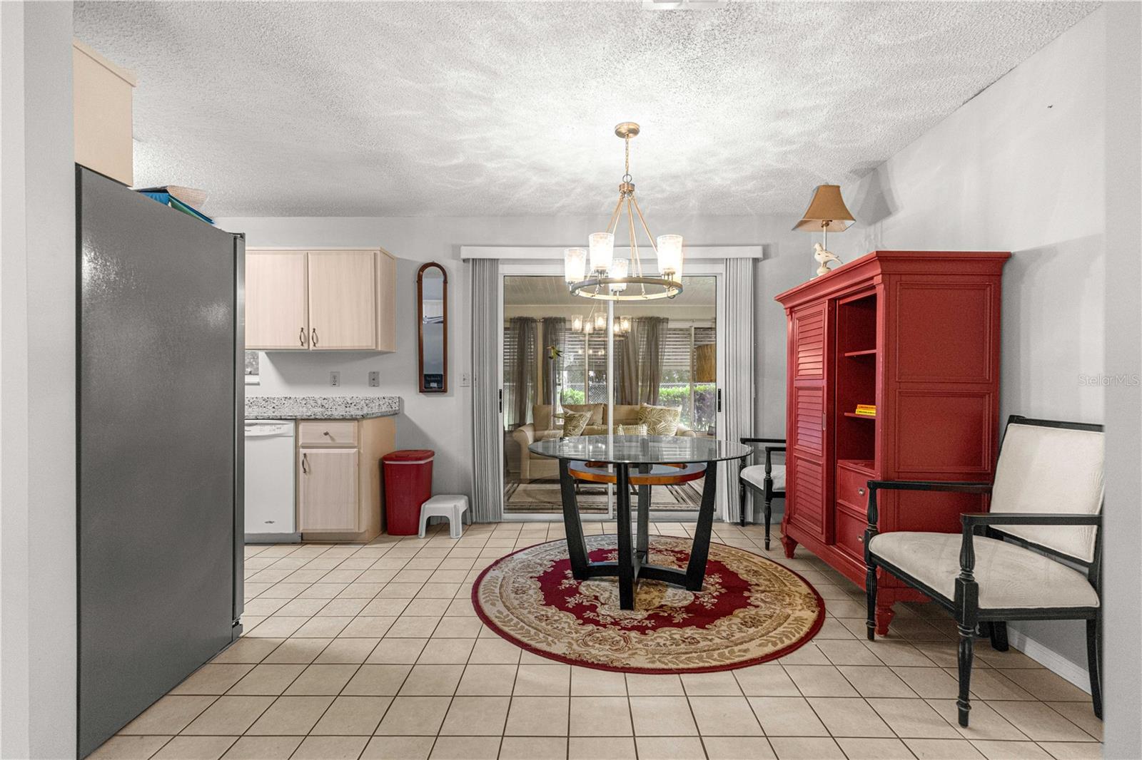 DINING TO KITCHEN AND FLORIDA ROOM