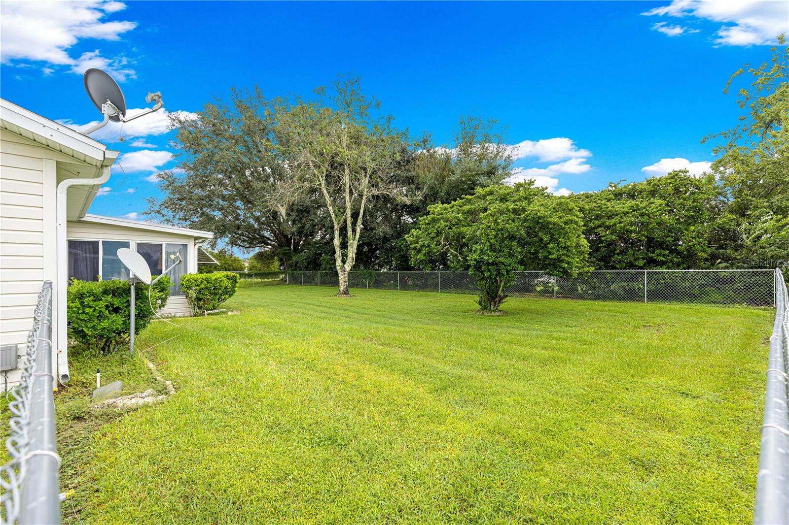FENCED IN OVER-SIZED BACK YARD