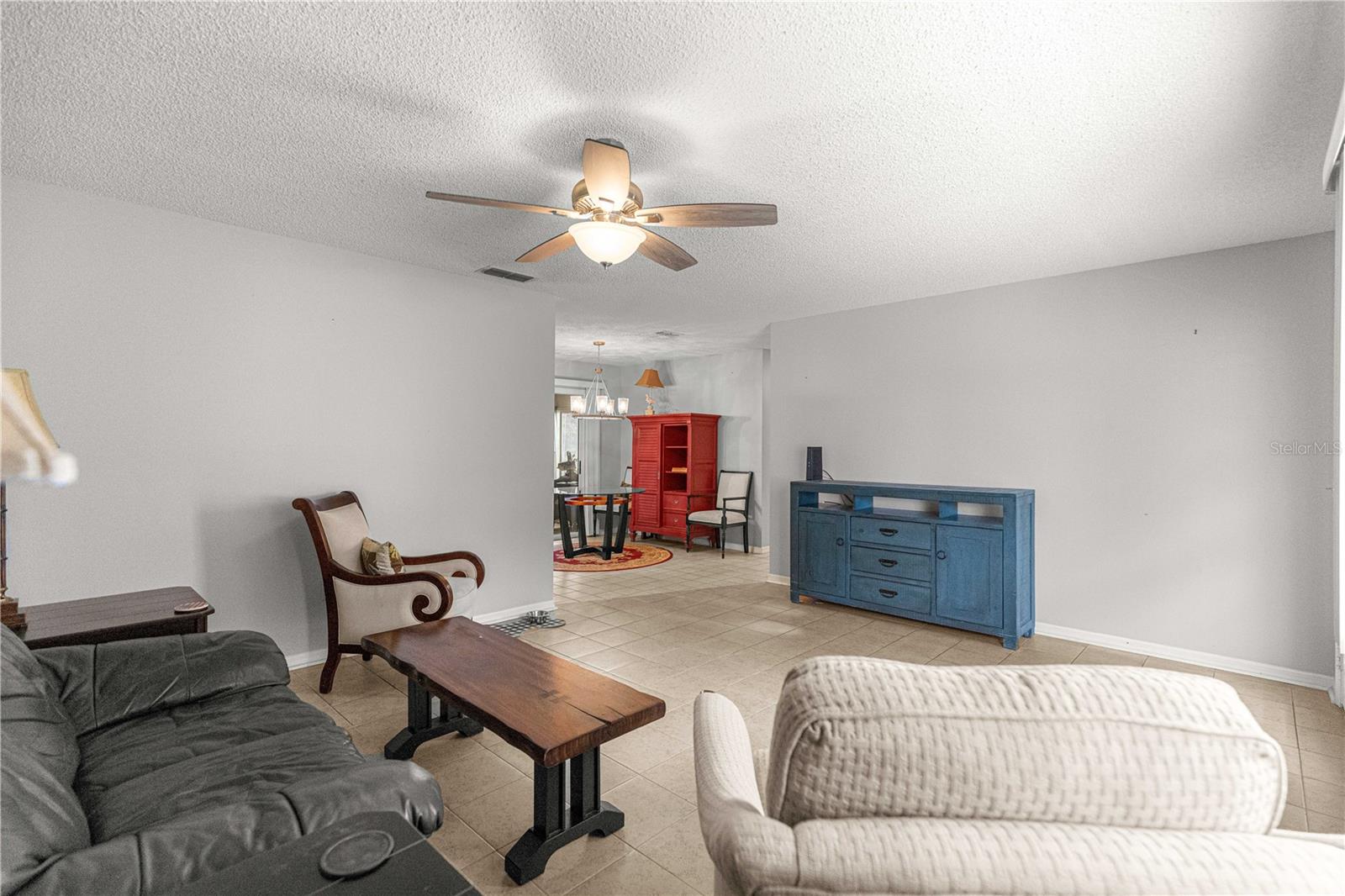 ANGLE VIEW OF LIVINGOOM TO DINING AREA
