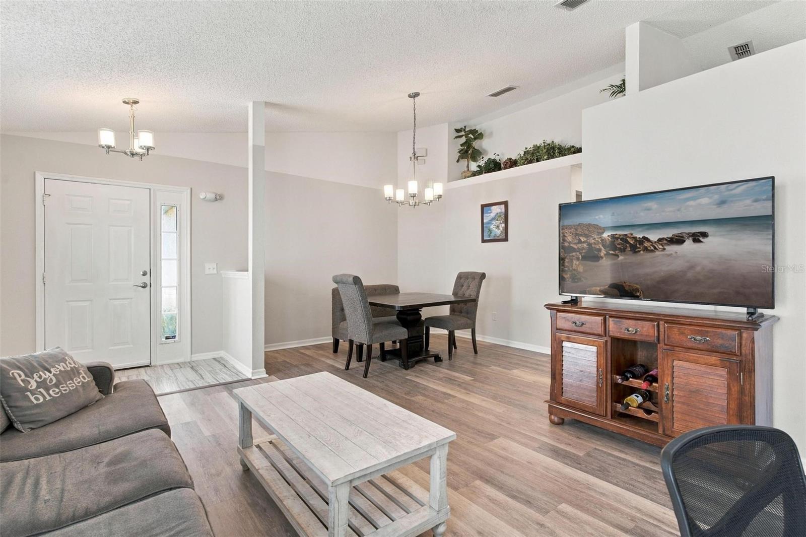 Living Room/Dining Area with Shelving
