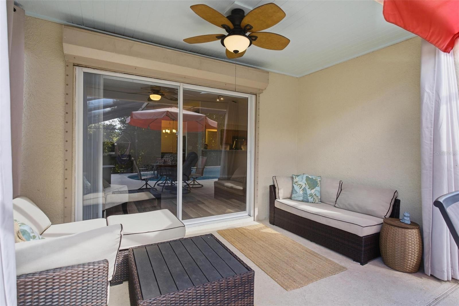 Covered Lanai with Sliding Doors to Family Room