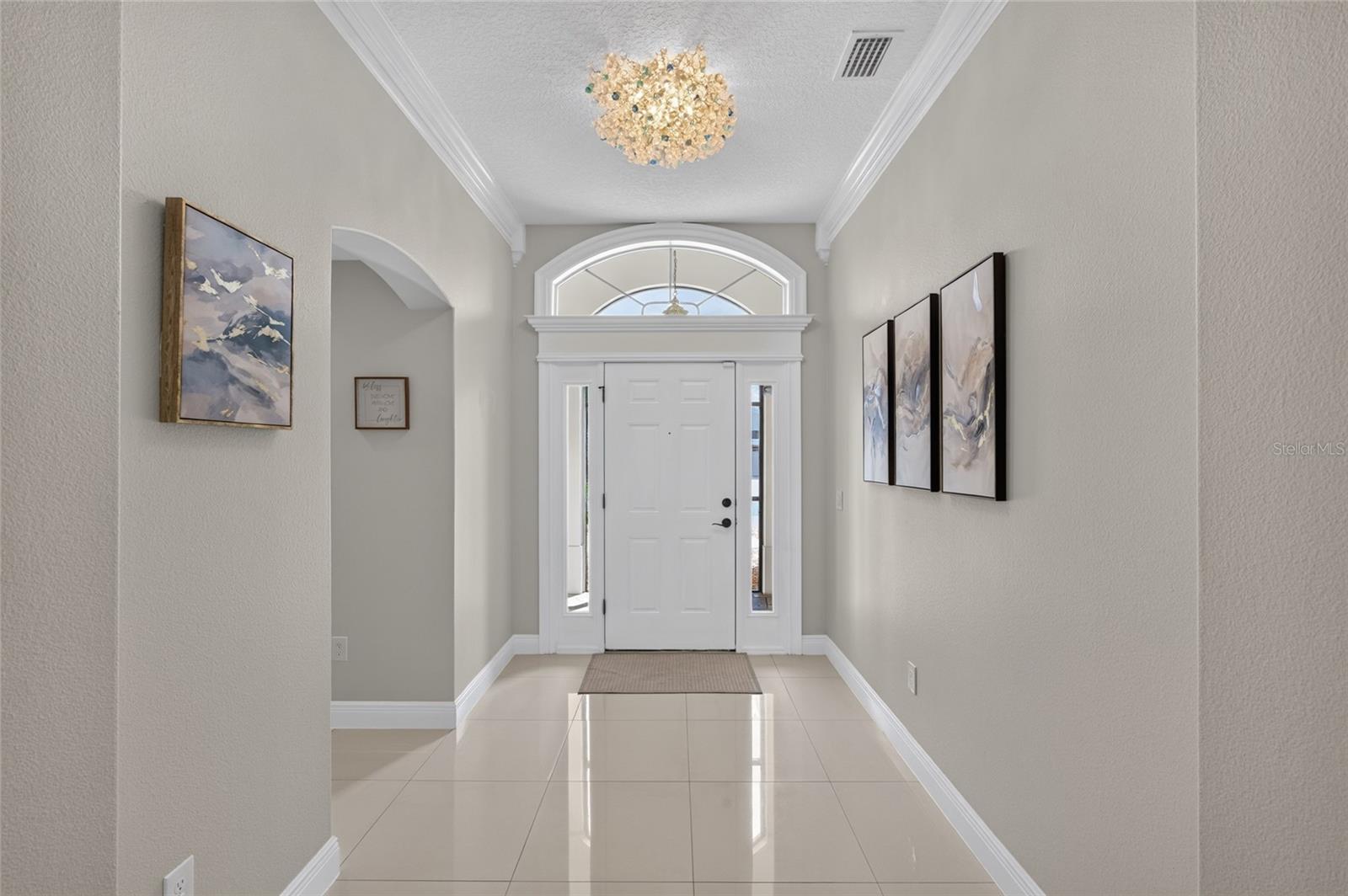LOOKING AT FRONT DOOR, BEDROOMS 2 AN 3 ARE TO THE LEFT