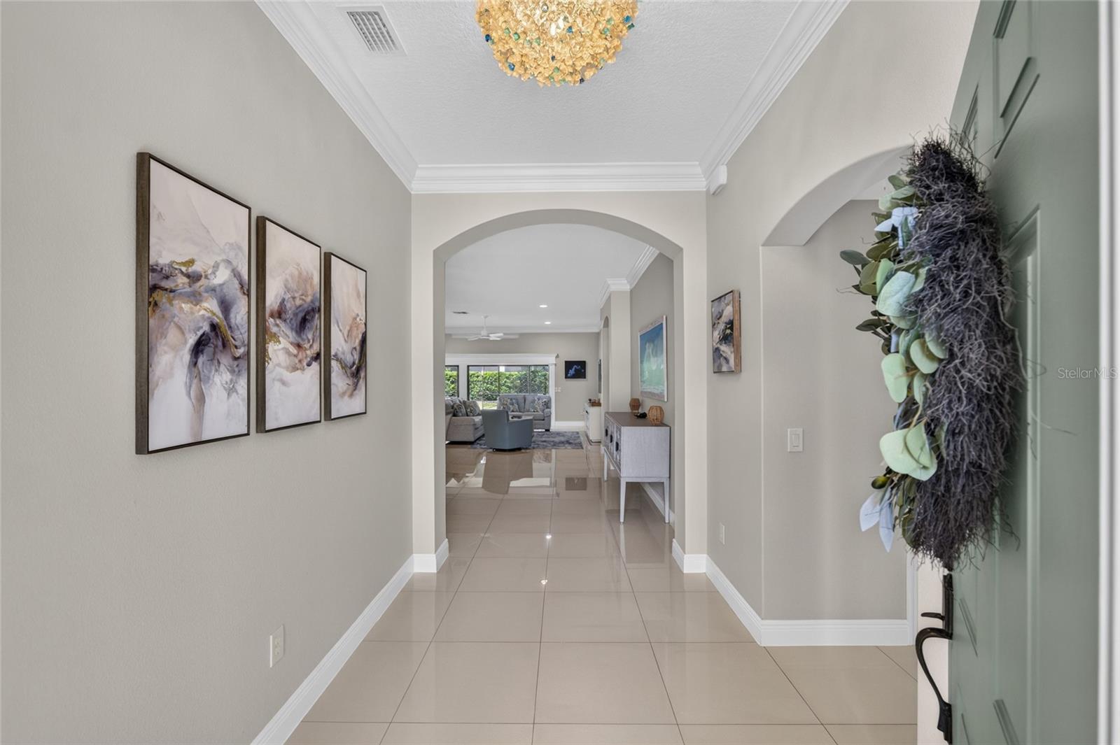 FOYER INTO HOME BEDROOMS 2 AND 3 TO THE RIGHT