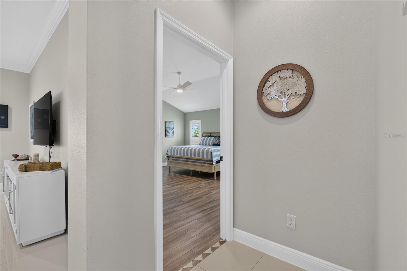 PRIMARY BEDROOM OFF THE LIVING ROOM