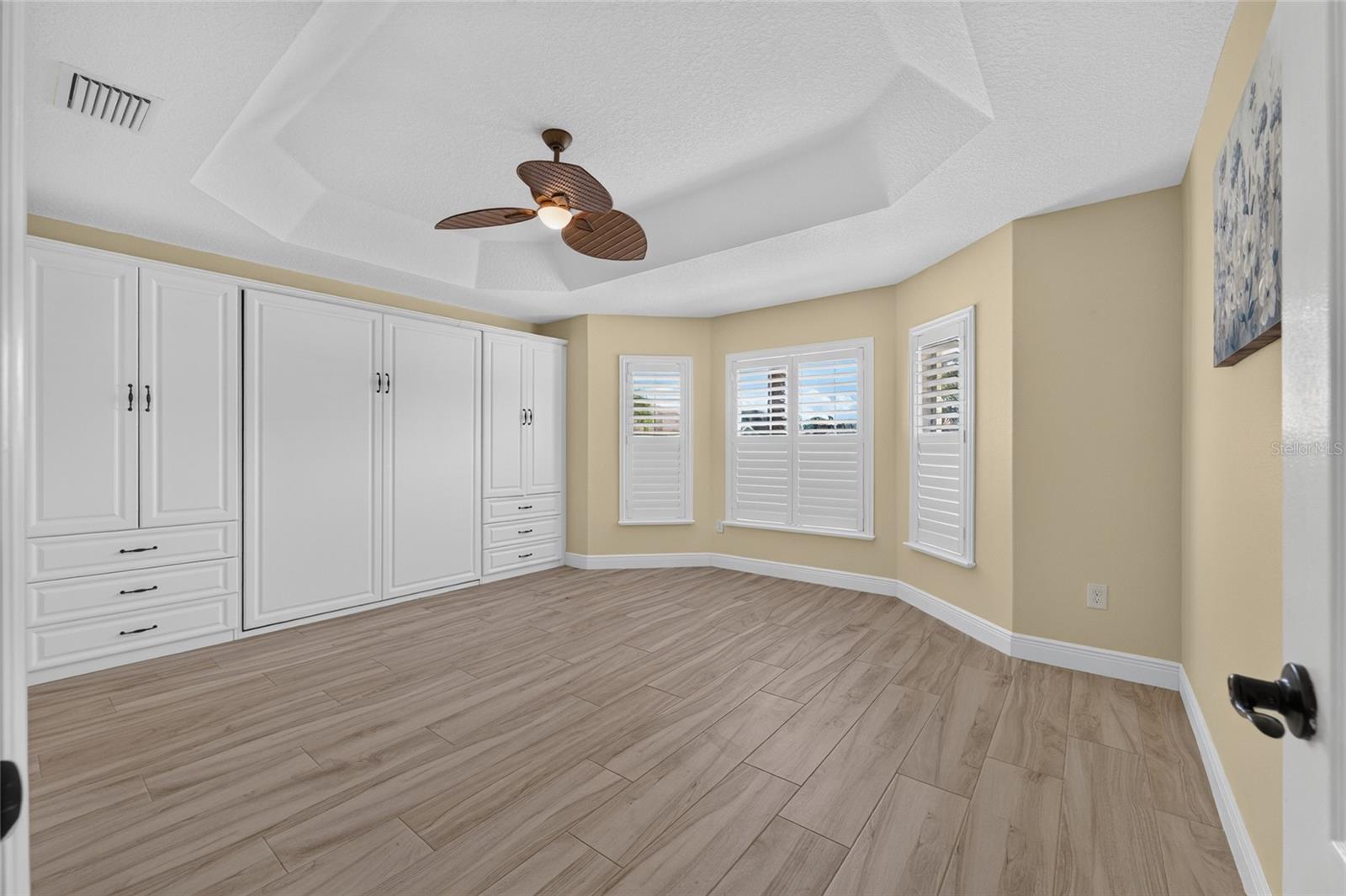 BEDROOM 2 WITH MURPHY BED CLOSED