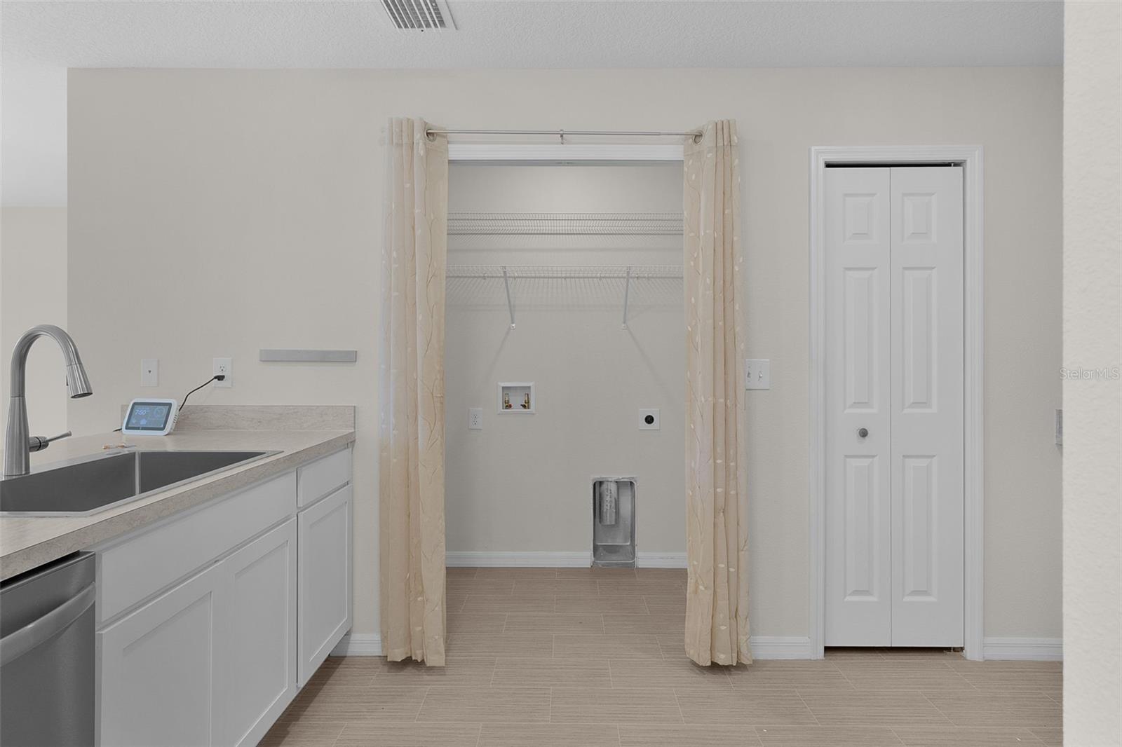 LAUNDRY INDOORS IS A PLUS!
