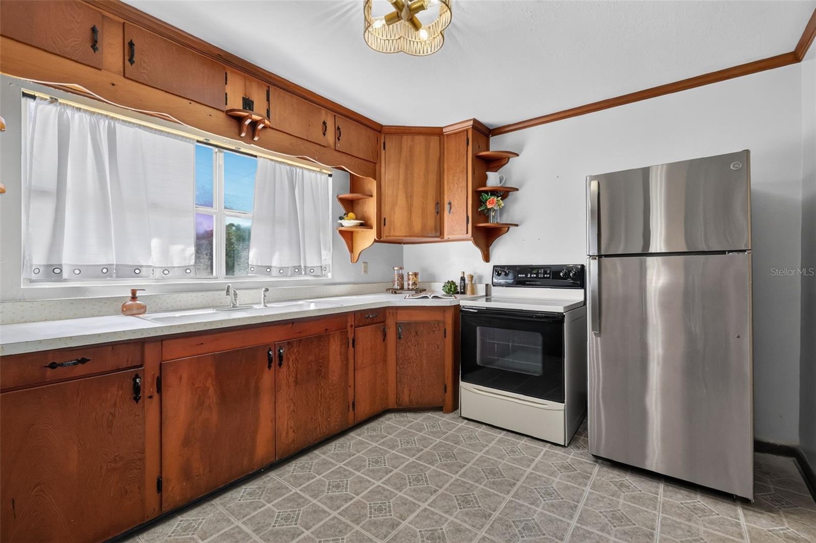 Kitchen with original hard wood cabinets