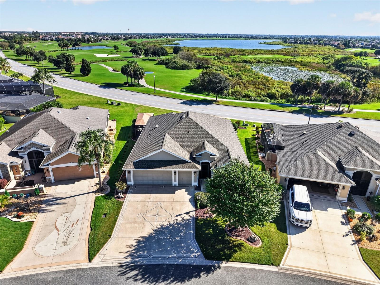 Aerial Front Elevation with Golf and Water Views