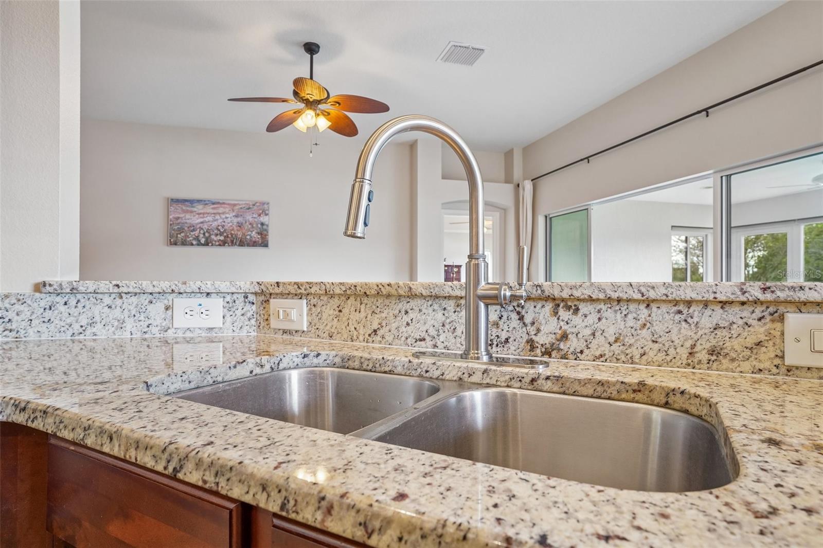 Kitchen Sink with New Faucet and Granite Countertops