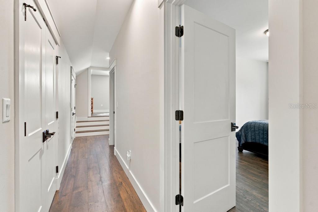 Hallway leads to bedrooms and walk-in closets!