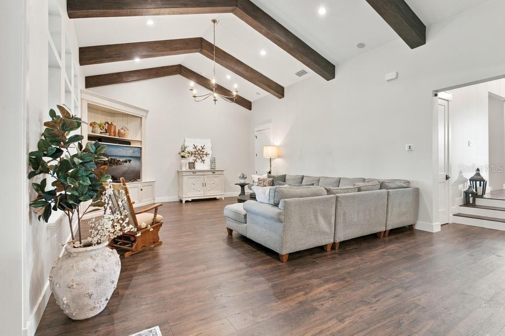 Cathedral Ceilings with the wood beams.