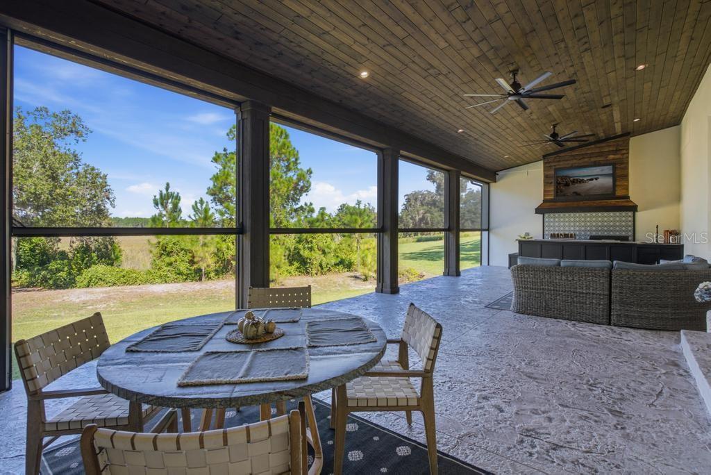 Back porch with view of the lake and nature